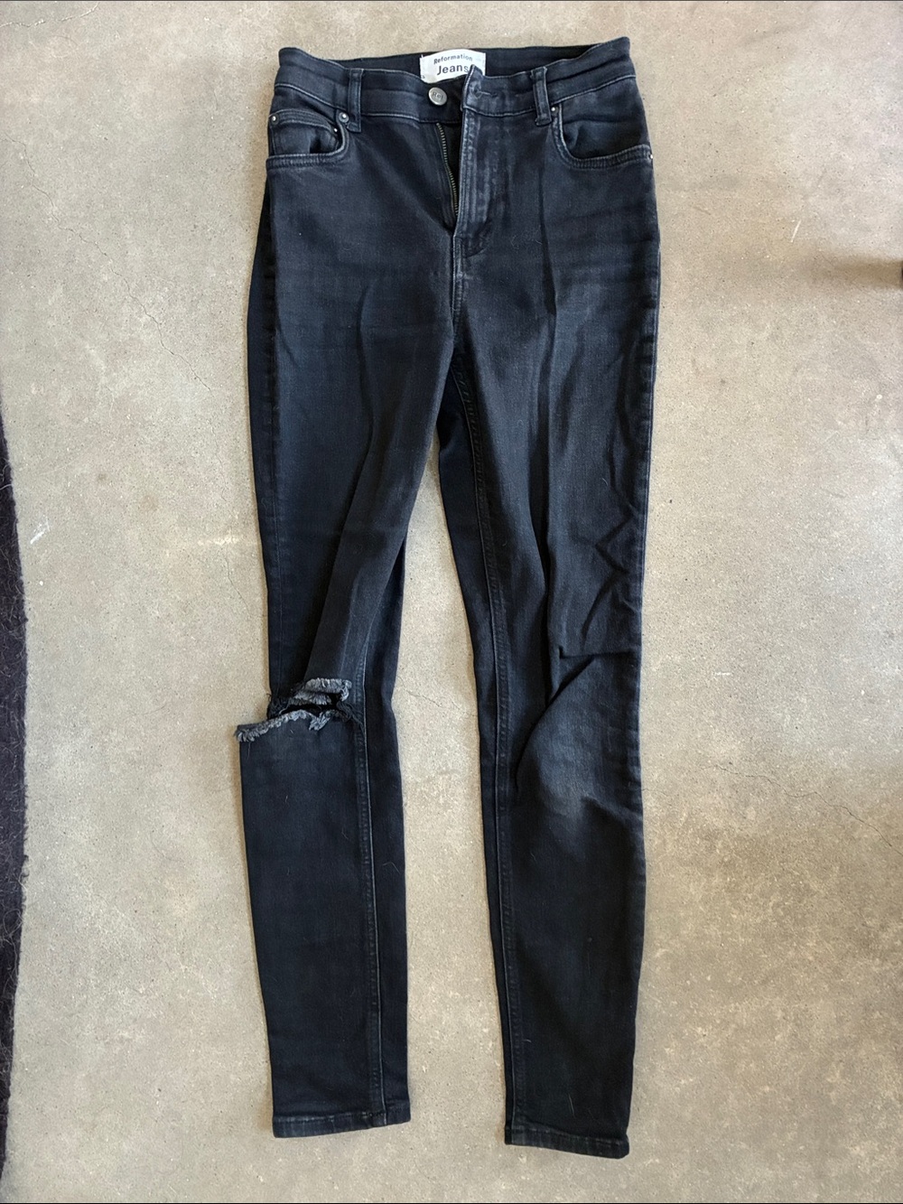 Reformation Black Skinny Jeans with Distressed Knee